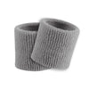 Two gray wristtbands on a white background
