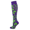 Purple knee-high sock with green polka dots on a white background